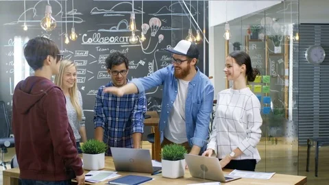 Diverse Team of Creative Developers Make Building Successful Partnership Gesture Stock Footage 84103401