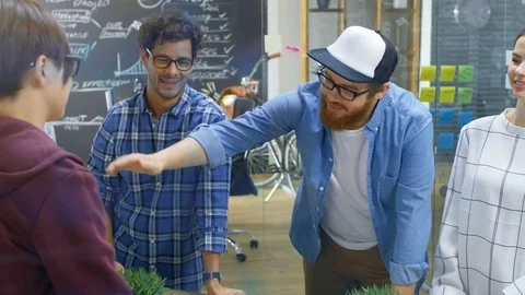 Diverse Team of Creative Developers Make Building Successful Partnership Gesture Stock Footage 84103984