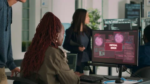 Diverse team of database admins having hacked server and security breach Stock Footage 221375116