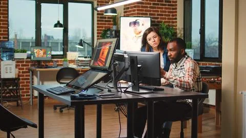 Diverse team of engineers working with artificial intelligence Stock Photos