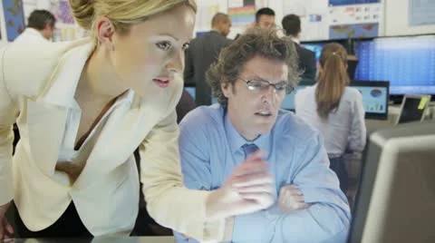 Diverse team of financial traders at work in the office Stock Footage 22256779