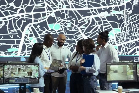 Diverse team of operators analyzing parcel awb and logistics Foto stock