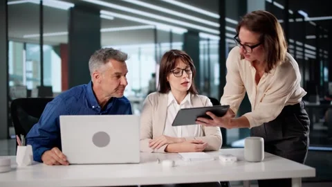 Diverse Team Predicts Market Performance Stock Footage 320257667