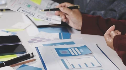 Diverse team of professionals engaged in a website graphic design board mee.. Stock Footage 316145000