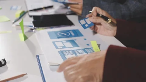 Diverse team of professionals engaged in a website graphic design board mee.. Stock Footage 316145093