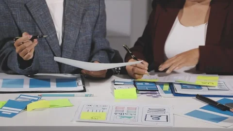 Diverse team of professionals engaged in a website graphic design board mee.. Stock Footage 316145121