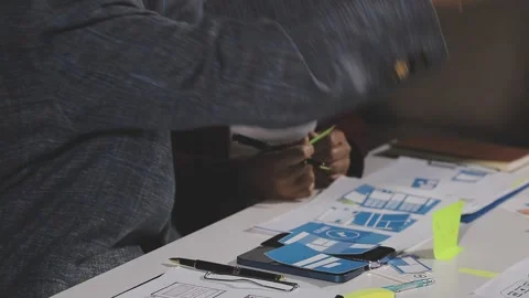 Diverse team of professionals engaged in a website graphic design board mee.. Stock Footage 316145182