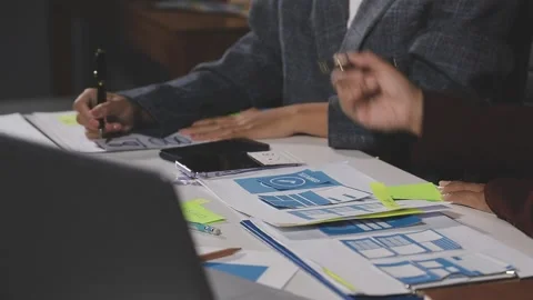 Diverse team of professionals engaged in a website graphic design board mee.. Stock Footage 316145185