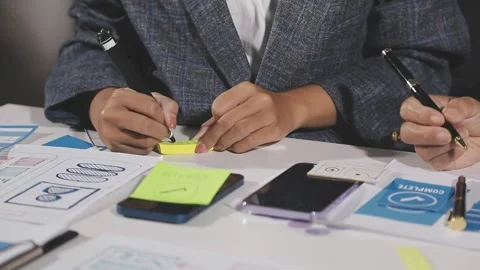 Diverse team of professionals engaged in a website graphic design board mee.. Stock Footage 316145208