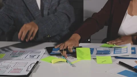 Diverse team of professionals engaged in a website graphic design board mee.. Stock Footage 316145234