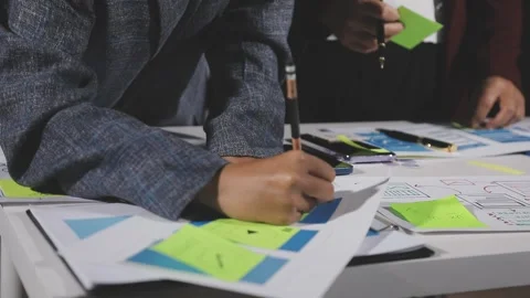 Diverse team of professionals engaged in a website graphic design board mee.. Stock Footage 316145373
