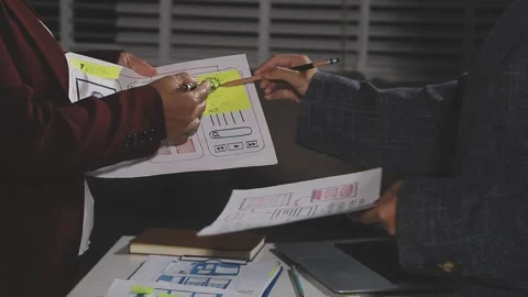 Diverse team of professionals engaged in a website graphic design board mee.. Stock Footage 316145472