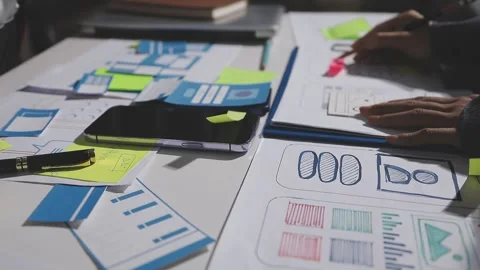 Diverse team of professionals engaged in a website graphic design board mee.. Stock Footage 316145657