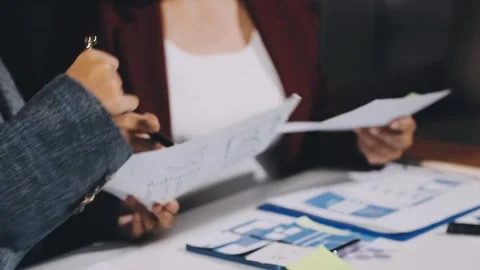 Diverse team of professionals engaged in a website graphic design board mee.. Stock Footage 317429344