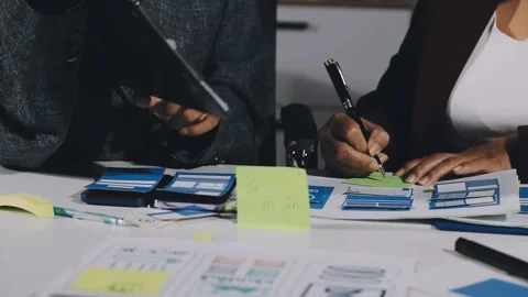 Diverse team of professionals engaged in a website graphic design board mee.. Stock Footage 317429357