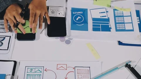 Diverse team of professionals engaged in a website graphic design board mee.. Stock Footage 317429373