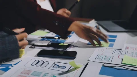 Diverse team of professionals engaged in a website graphic design board mee.. Stock Footage 317429379
