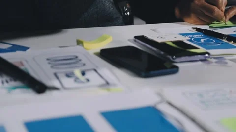 Diverse team of professionals engaged in a website graphic design board mee.. Stock Footage 317429380