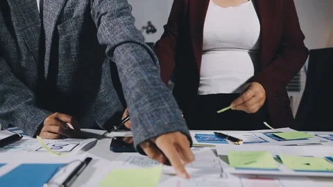 Diverse team of professionals engaged in a website graphic design board mee.. Stock Footage 317429404
