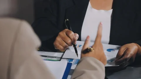 Diverse team of professionals engaged in a website graphic design board mee.. Stock Footage 317429471