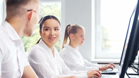 Diverse team of professionals is working in the e-mail support center. Working Stock Footage 160205608