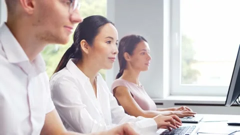 Diverse team of professionals is working in the e-mail support center. Working Stock Footage 160558315