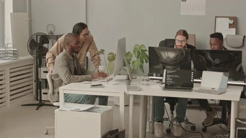 Diverse Team of Programmers Coworking in Office Stock Footage 165719935