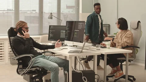 Diverse Team of Programmers Coworking at Open Space Office Stock Footage 165722924