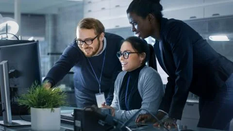 Diverse Team of Research Engineers Working in a high Tech Laboratory on a Hig 스톡 사진