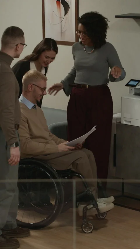 Diverse Team of Smiling Office Workers Meeting at Printer in Corridor Stock Footage 309039545