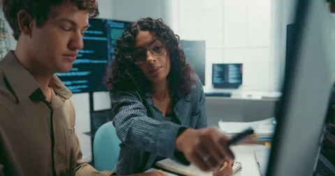 Diverse team software developer discuss AI coding and project at office. Stock Footage 343929062