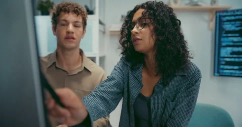 Diverse team software developer discuss AI coding and project at office. Stock Footage 343929863