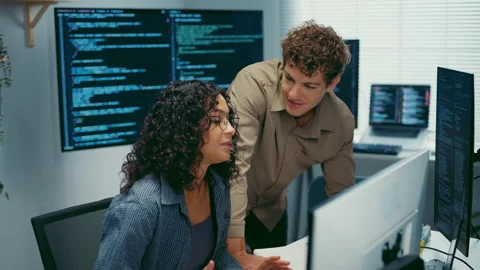 Diverse team software developer discuss AI coding and project at office. 動画素材 347150999