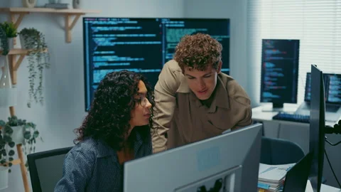 Diverse team software developer discuss AI coding and project at office. Stockbeeldmateriaal 347151000