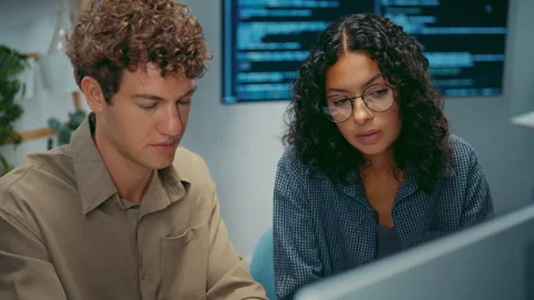 Diverse team software developer discuss AI coding and project at office. Stockbeeldmateriaal 347151661