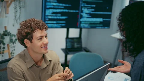 Diverse team software developer discuss AI coding and project at office. 動画素材 347152085