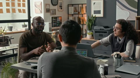 Diverse Team of Software Developers Having Discussion during Workday in Office Stock Footage 329613378