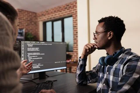 Diverse tech enginners developing machine learning algorithm Fotos de archivo