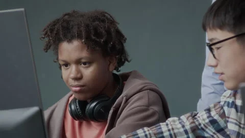 Diverse Teenage Schoolboys Studying Programming and Engineering in Classroom Stock Footage 284431904