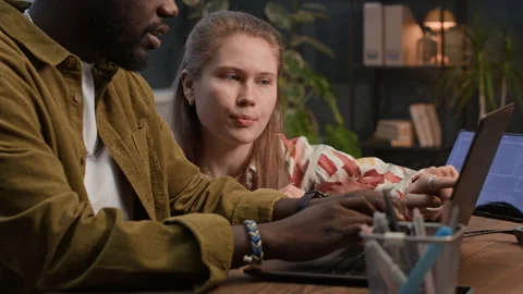 Diverse Testers Developing App on Digital Devices at Office Video stock 302890312