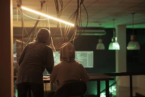 Diverse thieves attacking database passwords and security encryption 写真素材