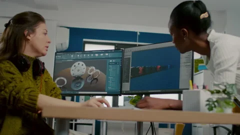 Diverse women game software developers creating game interface Stock Footage 152784404