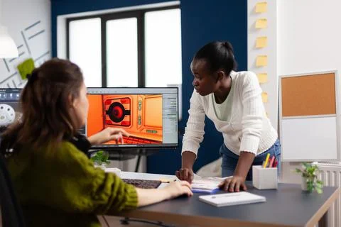 Diverse women game sofware developers testing new game 스톡 사진