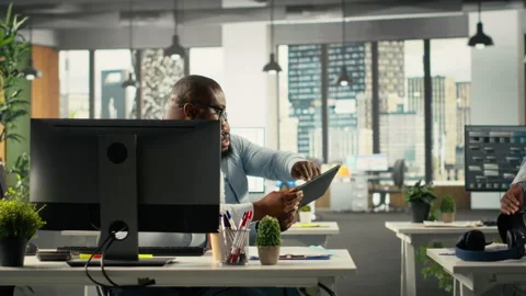 Diverse work team study analytics and forecasting to focus on performance Stock Footage 322139110