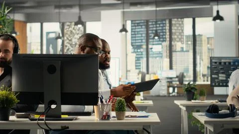 Diverse work team study analytics and forecasting to focus on performance Stock Photos