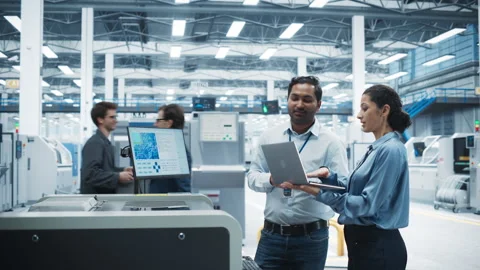 Diverse Workers Using Solder Jet Printer On Tech Factory Stock Footage 260481046