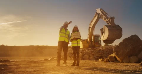 Diverse Workers Walking On Construction Site With Laptop Stock Footage 256041306