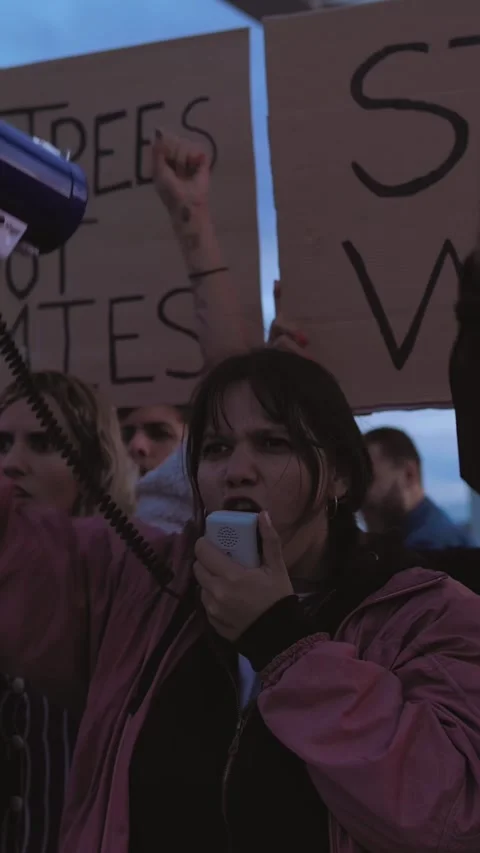 Diverse young people protesting against war and violence. Stock Footage 318540897