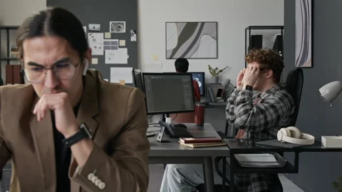 Diverse Young Programmers Coding on Laptop in Tech Office Stock-Footage 336709025