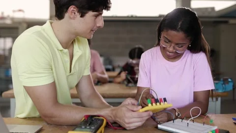 Diverse young school students learning electronic at technology class Stock Footage 209158598